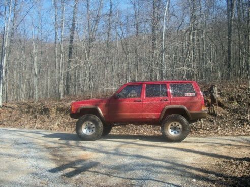 #1 sons 96 on 33s and 6in  long arm lift
