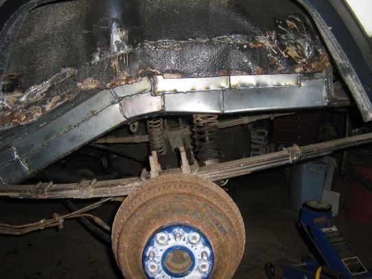 Box that frame and weld solid back to the new floor plates. 16ga, overlapped, weld to base and all seams. Drivers outside