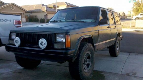 new hella lights before i rolled the front fender, and buffed the paint.