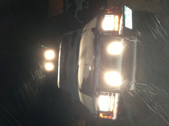 Snowing hard.  Cheap roof rack lights from Harbor until I find an LED bar.