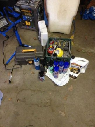 Before I tore into it. Lots of spray cans, mostly degreaser and black paint.