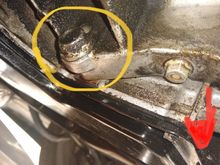 Yellow circle transmission mount bolt.
Red arrow, transmission pan fluid leaking. 