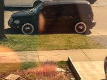 Those wheels are now on this black panel, with wide white walls!