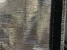 The outside aluminum heat shielding side