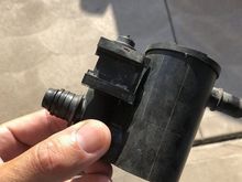 See the seal on the canister side (left) port above my thumb ?
That usually gets tossed with the old part . 
Careful removing it , at this age it’ll be brittle. 