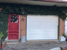 New door , reframed, new weatherstripping, new Clopay four panel insulated roll up door! Only took 6 hours including lunch. 