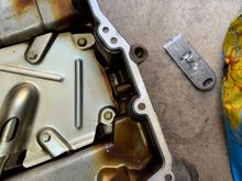 The oil pan rails , still need to be cleaned 
