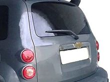 Just an idea, but could this possibly be reworked to fit the front windshield, measure 60 times cut once? Maybe need two to make one!? 
I don’t have my sheet metal equipment any more, but an English wheel and a planishing hammer along with hours of metal shaping , a nice visor could be a possibility. 