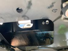 You can access the passenger side from inside the hatch 
