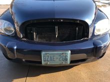 Simple remove your stock grille 