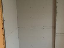This area, by the shower, done! The towel rack will go on that wall, over there