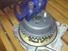 pump with sprocket, tool and pilot stud.  The sprocket will be inside the chain cover.