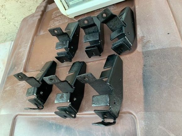 Cleaned, primed, and painted these brackets.  They were rusty.