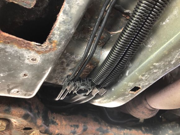 I clipped all the nylon or plastic lines into the line brackets and covered them in exposed to road debris area to protect from abrasions 