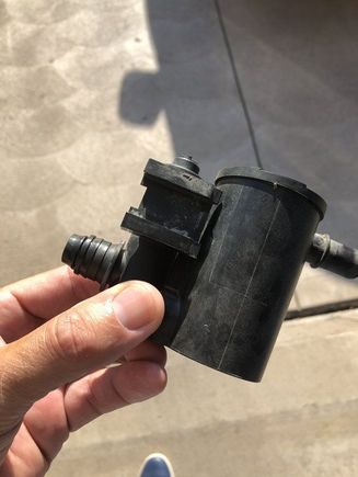 See the seal on the canister side (left) port above my thumb ?
That usually gets tossed with the old part . 
Careful removing it , at this age it’ll be brittle. 