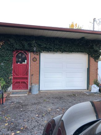 New door , reframed, new weatherstripping, new Clopay four panel insulated roll up door! Only took 6 hours including lunch. 