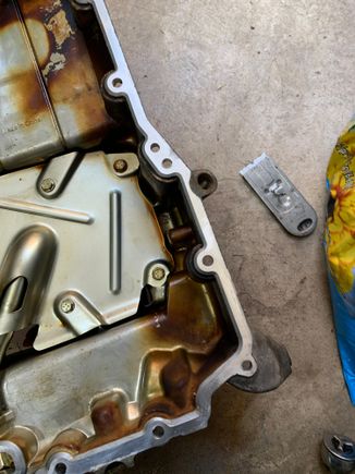 The oil pan rails , still need to be cleaned 