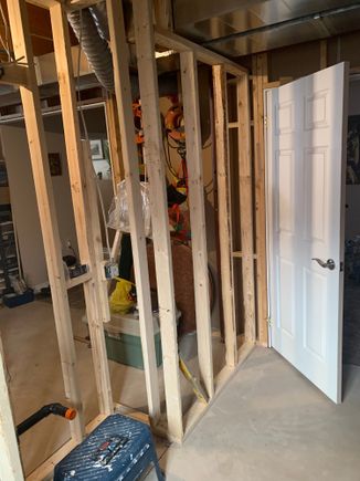 The right side when you walk in,  the vanity will go in that alcove where the blue step stool is