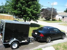The Race Rig - 2003 LX with a Light Weight Distribution Hitch set-up, pulling a 4' x 6' trailer.