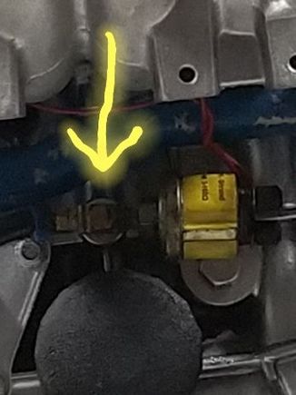 brass 4-way block handling the oil pressure and the turbo feed line.