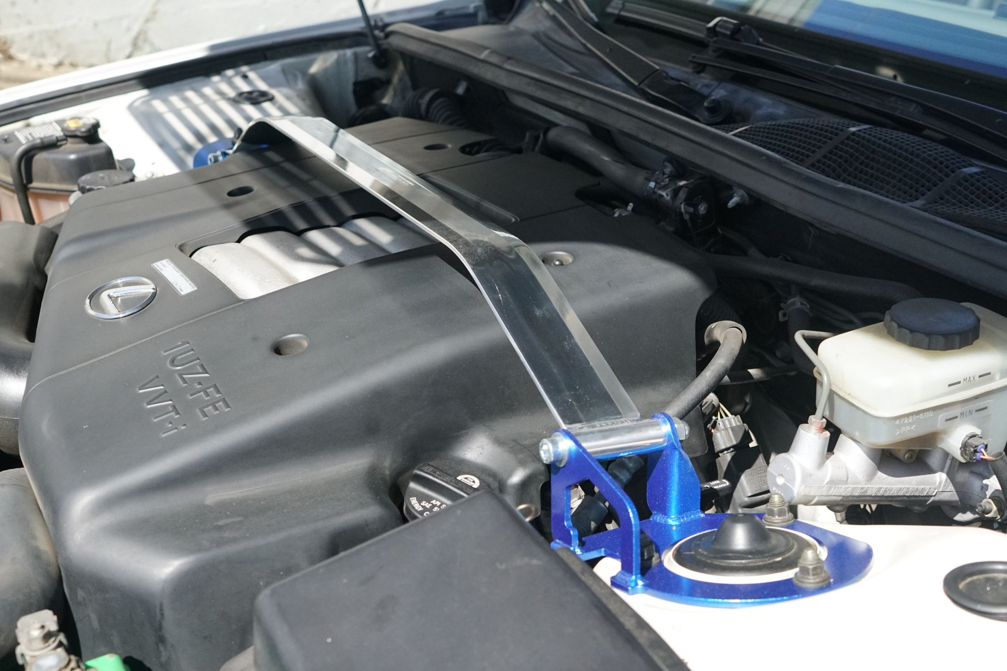 Wider view of Cusco front strut bar. 