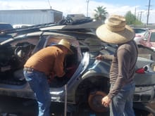 These are the workers at the salvage yard.  I arrived at 9am to pay for the panel.   They insisted on removing the panel for me.  I was instructed to pick it up later in the day.