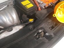 Now turn off the engine and wait couple minutes ,very slowly remove yellow funnel which you plugged with middle handle to prevent coolant spill.put back original radiator cap and that is it.