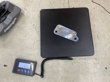 Supplied caliper brackets (MKIV Supra kit).  .68 pounds