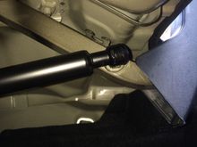 remove both rubber bumpers so you can connect the other end. They just snap into the nipple. No need to pry the clip open.