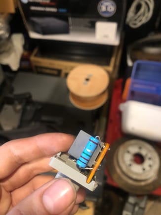 After removing the factory shunt, I soldered in a 0.3 ohm 1w resistor. This will allow you to run simple and efficient LED bulbs without built-in resistors, and you can still run incandescent bulbs as well. It will hyperflash if an LED burns out too! Much better and cheaper than those aftermarket solutions.