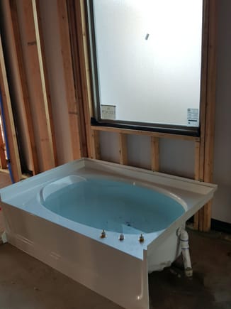Tubs and shower pan are in!