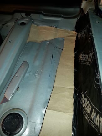 Interior side of rocker panel (at door sill) covered with Boom Mat and paper template fitted for floor pan to be covered...because the carpet is so precisely fitted it covered that by adding another 4mm over factory materisl might cause fitment issues..