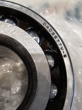 Dealer provided Koyo brand bearing does not incorporate bearing cover/ seal