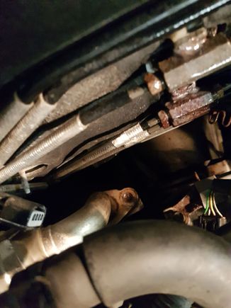 Here was problem HEAR RECOVERY UNIT flange studs were rusted so much that we couldnt remove  them.we stoped here .all 3 front spark plugs were replaced here with oem spec iridium Denso and one on the back as well but 2 of them under heat recovery unit were not replaced.