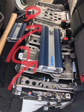 It is super easy to pop off the bottom back seat.

Have a look at my picture here to show you where the two clamps are - from the front of that seat at those spots just tug it up and once they release you can take off the whole seat in a matter of really seconds.
