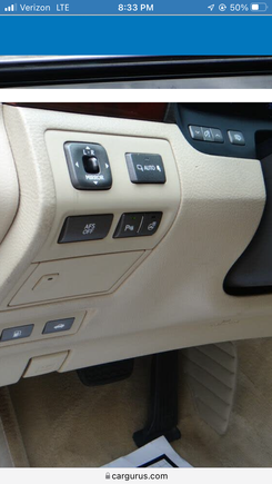 Discoloration at the left edge between the controls, gouged/missing part to the right of controls indicate the lower dash is going soft. Dirt buildup near knees means it's sticky