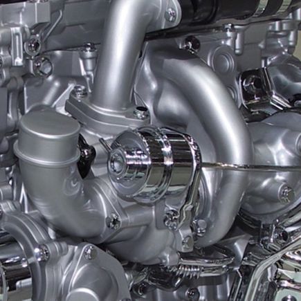 I can’t see anything in your photo of the stock engine. Looks like there’s stuff covering a majority of the stock turbo. the picture angle is different too. Maybe these photos will help us further determine