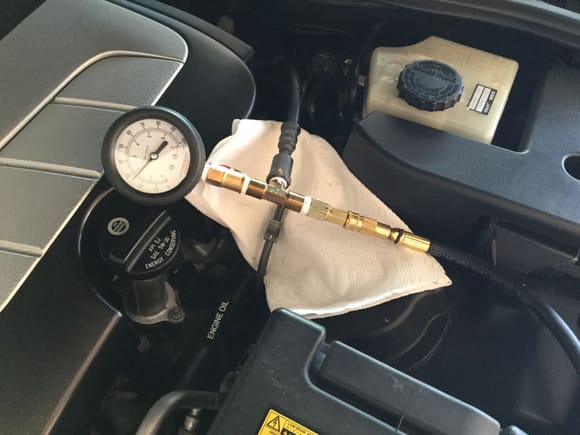 A tee was placed on the engine side of the fuel line.  I also added another pressure gauge to compare both gauges.