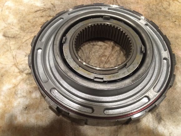 Second gear piston reassembled with new seals.