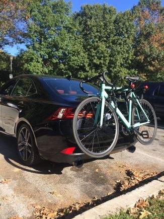 Got the allens sports deluxe bike rack for the whip at walmart. Doesnt scratch the car, because in reality it all depends how you strap on the bike to the trunk. Its a two bike rack i usually have my bike on and also my girlfriends cruiser bike on it. No issue. Love it.