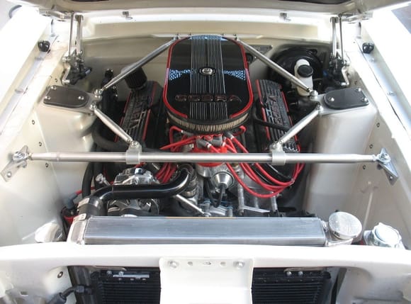 The engine is an electronic fuel injected 347 stroker 435hp coupled to a T-5 transmission and nodular 9&quot; positraction  differential hosting 3.70:1 ratio gears.