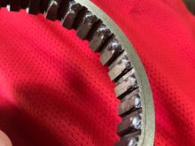 5th gear synchro sleeve teeth worn down.