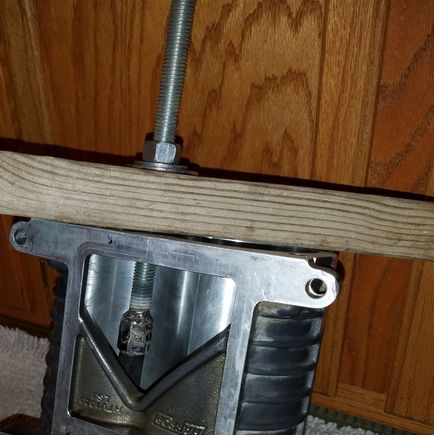 Took two hex nuts with the same thread/size as the end of my blind bore bearing remover head and welded them together and then welded them to a piece of all thread.  I used I wood 2x4 to brace against the face and a wrench driving a nut to extract the bearings.  The slide hammer that came with the head was not enough to break the bearings loose.