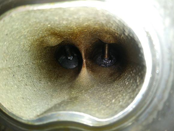 This is 8,000 miles after cleaning them. Cause= failed brand new pcv valve (stuck open) 
Intake port 4