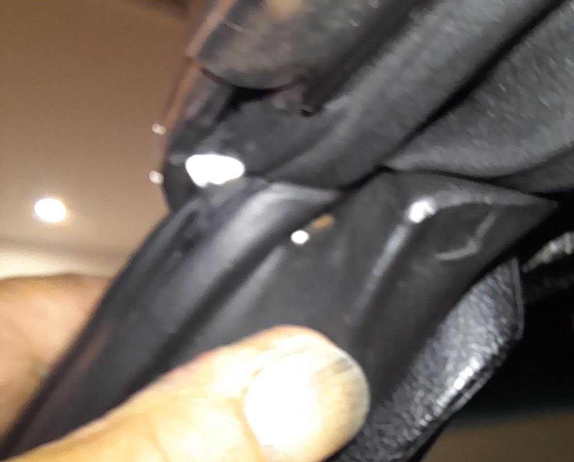 See the little brown spot? That's the screw.