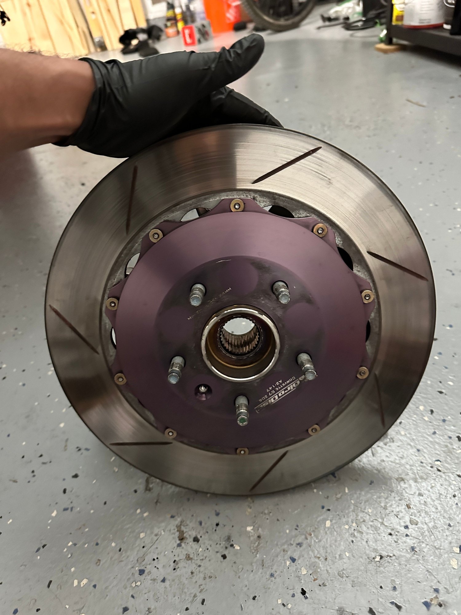 How to remove a freely spinning but laterally stuck rear brake rotor