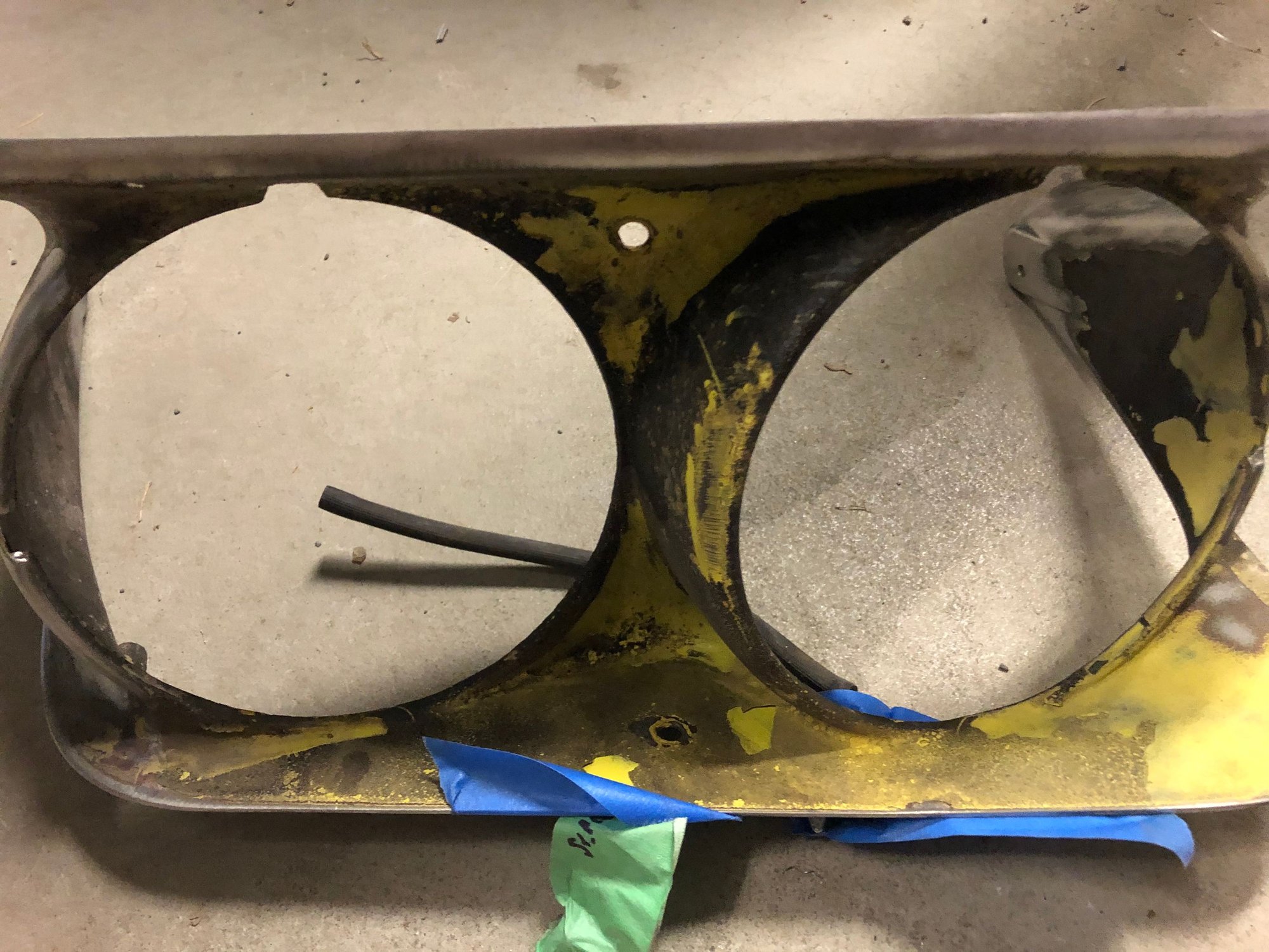 69 Headlight washer nozzle hitting actuator front link arm