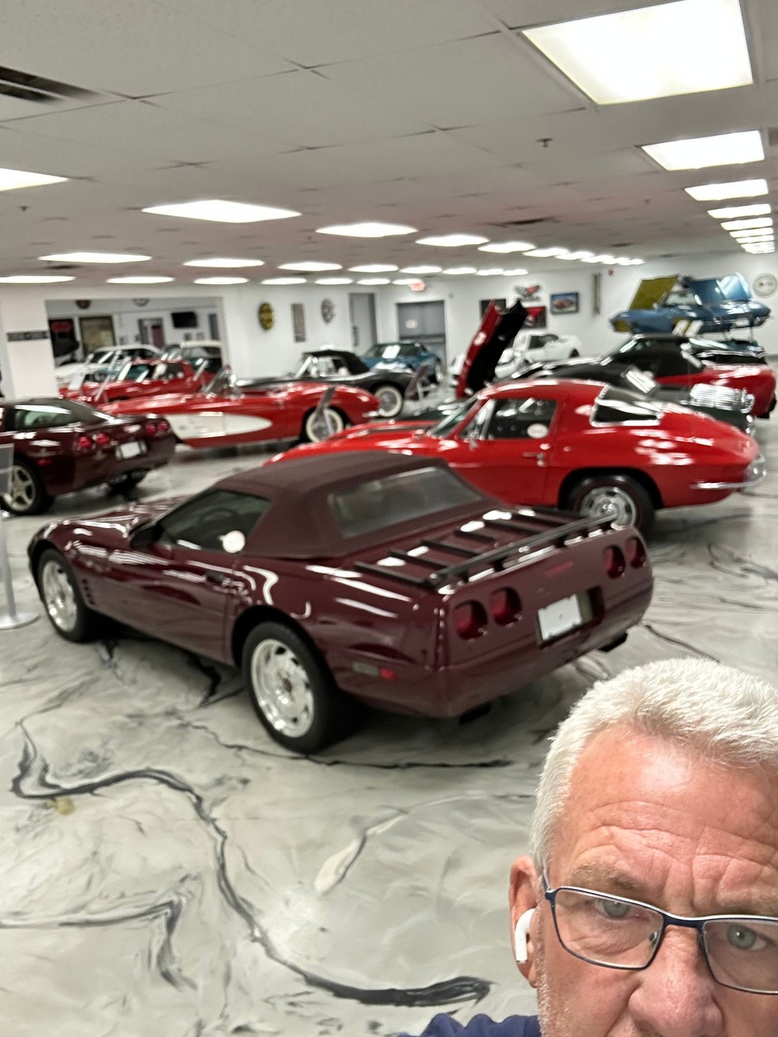 My boss owns 257 cars and this is some of his corvettes.  