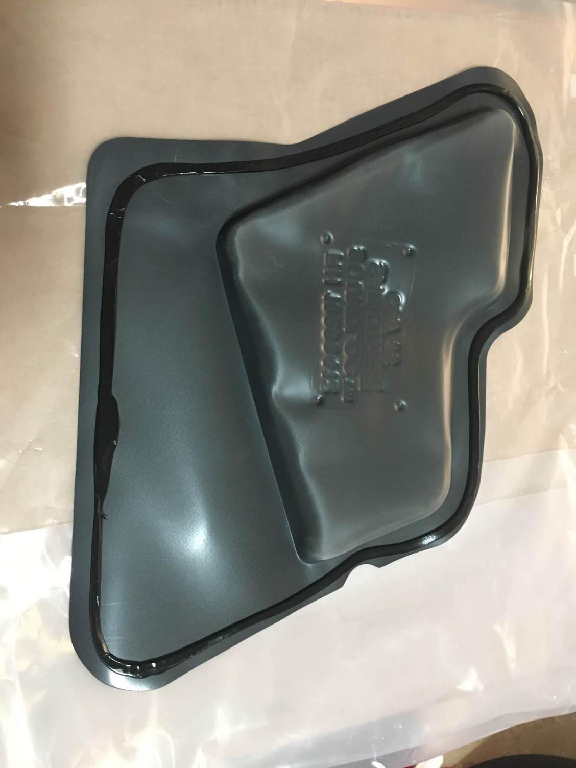 New OEM Door Water Shield Installation [Adhesive/Caulking