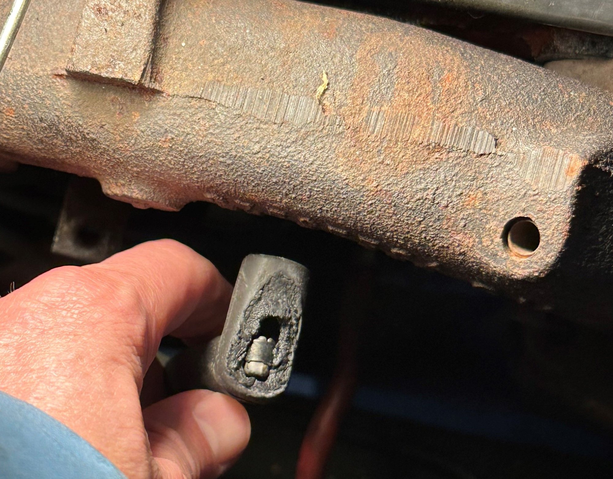 Burnt spark plug wire boot and fouled plugs? CorvetteForum